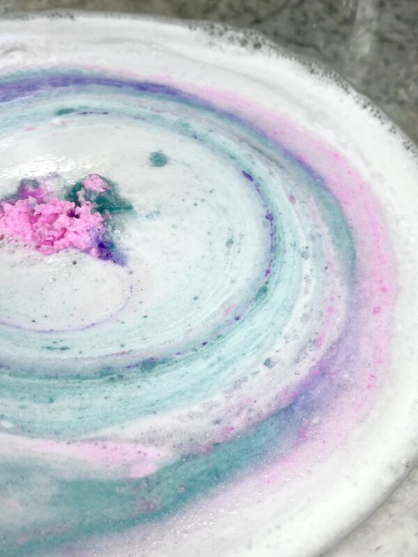Rainbow Bath Bomb in the water